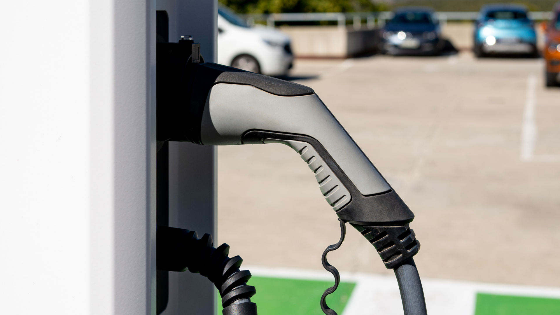 electric car at gas station